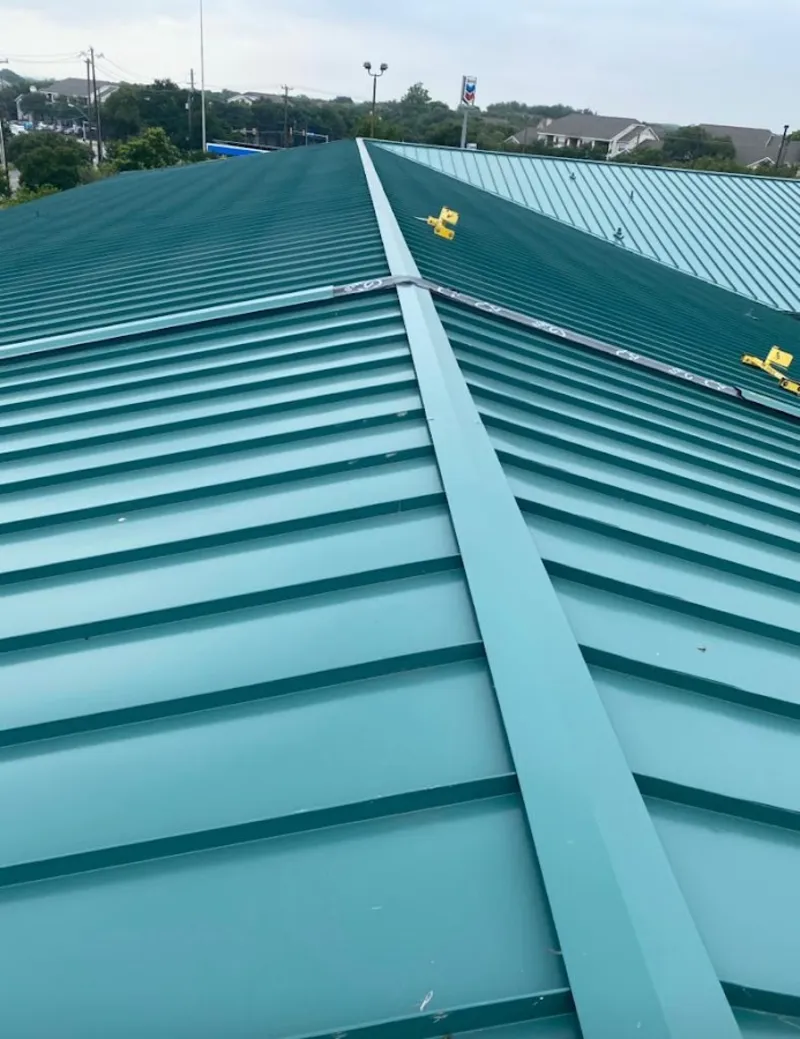 Green commercial metal roof ridge and valley for Metal Roof Repair in Johnston