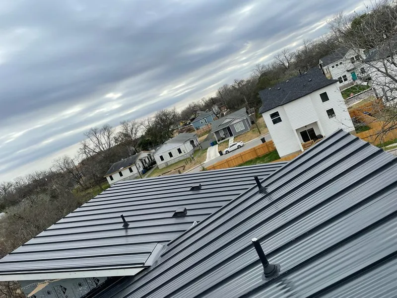 Standing seam metal roof panels with vents for Skylight Repair in Johnston